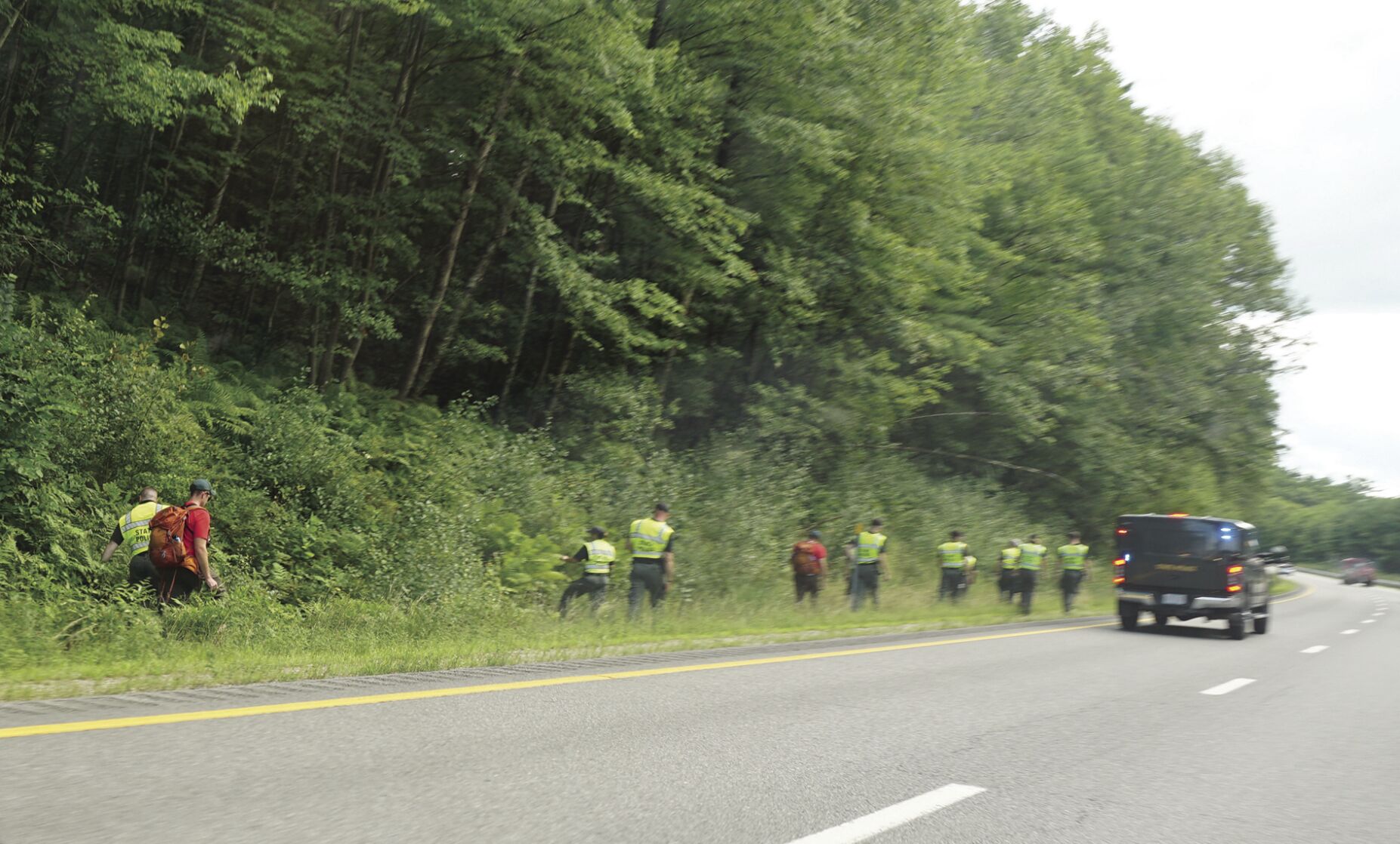 State police search I-93 for evidence in triple homicide